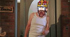 a man with a crown on his head is standing in front of a door with a sign that says lemons on it