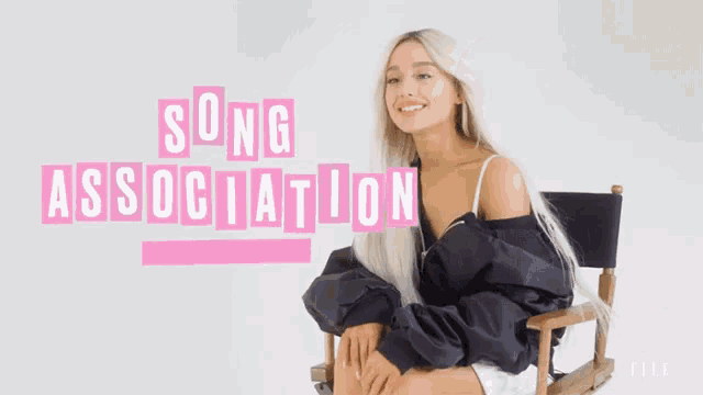 ariana grande is sitting in a director 's chair with the words song association behind her