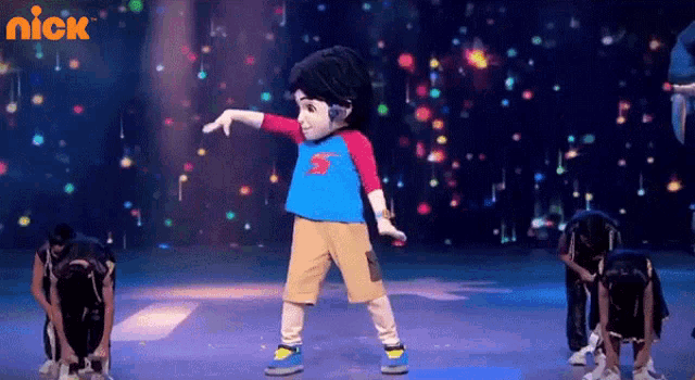 a cartoon character is dancing on a stage with the nick logo in the background