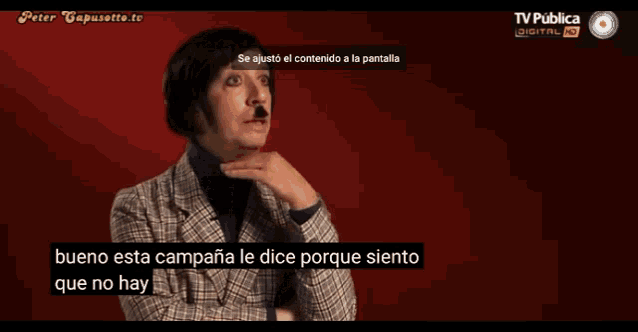 a man with a mustache is talking on a screen that says tv publica digital hd