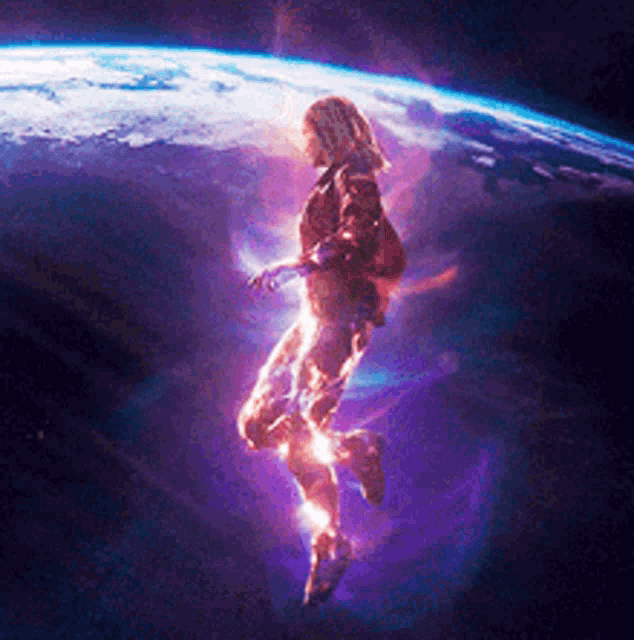 a woman is flying through the air in front of a planet earth