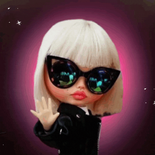 a doll wearing sunglasses and a black jacket is waving her hand