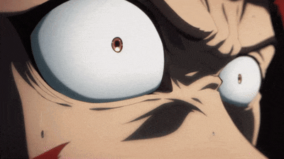 a close up of a person 's face with big white eyes and a red eye