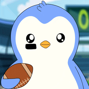 a blue and white penguin is holding a football in its hand