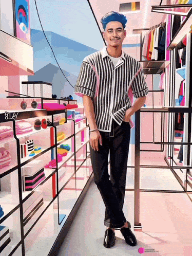 a man in a striped shirt and black pants is standing in a store with a sign that says 8lay on it
