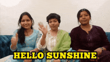 three women sitting on a couch with the words hello sunshine written above them