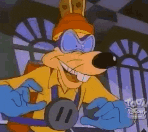 a cartoon character is wearing a yellow shirt and blue gloves and is smiling .