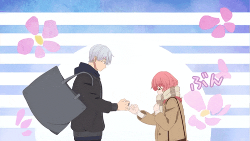 a man and a woman are holding hands with flowers in the background and the man is carrying a bag