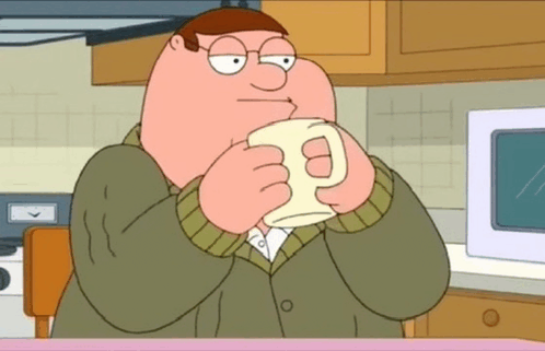 peter griffin from family guy drinking a cup of coffee in a kitchen