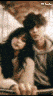 a blurry picture of a man and a woman with the caption capcut at the bottom