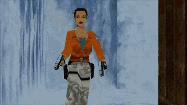 a woman in an orange jacket is holding a gun in her right hand
