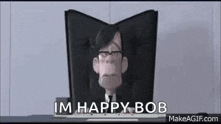a cartoon character is sitting in front of a computer screen .