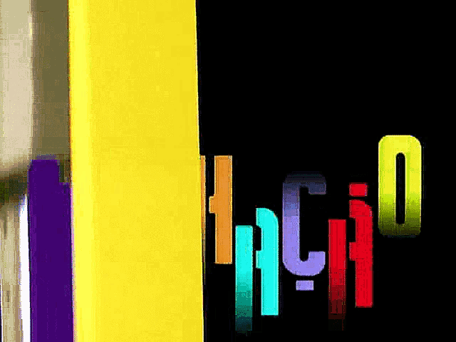 a black background with a rainbow of colored letters including the letters h and o