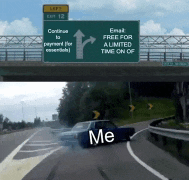 a car is driving down a highway next to a sign that says email free for a limited time