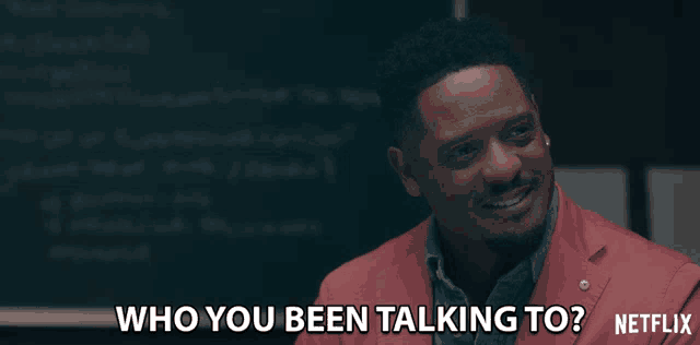 a man in a red suit asks who you been talking to