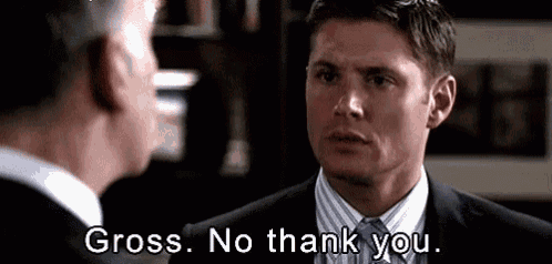 a man in a suit and tie is talking to another man and says `` gross . no thank you . ''