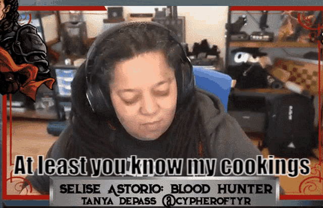 a woman wearing headphones with a sign that says at least you know my cookings
