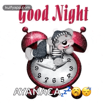 a teddy bear is laying on top of an alarm clock with the words `` good night '' written on it .