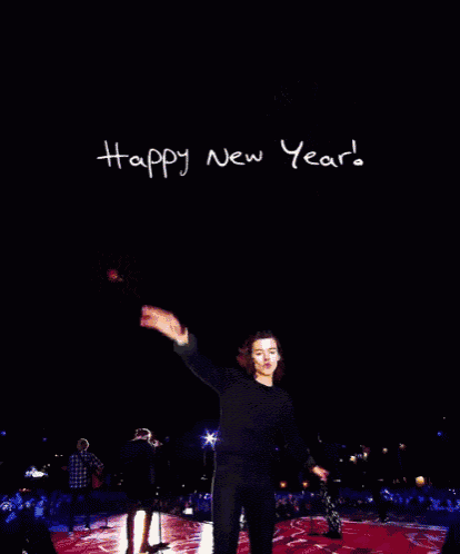 a fireworks display with the words happy new year 's written on the bottom