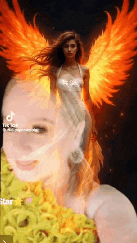 a woman in a white dress with flaming wings is holding a bouquet of sunflowers .