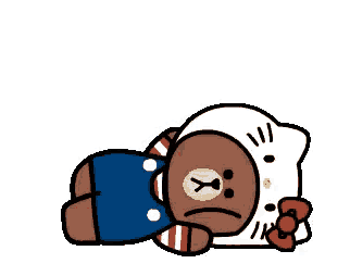a cartoon brown bear is laying on a bed with a hello kitty costume on .