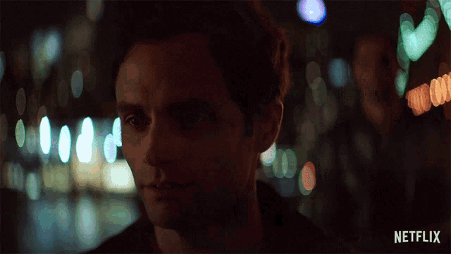 a close up of a man 's face with netflix written on the bottom