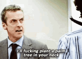 a man in a suit and tie is saying i 'll plant a palm tree in your neck