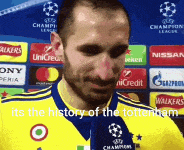 a man in a yellow and blue jersey says it 's the history of tottenham