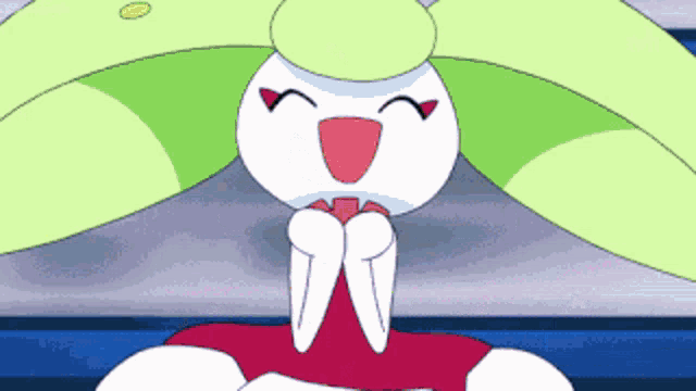 a cartoon character with green and white wings and a red nose