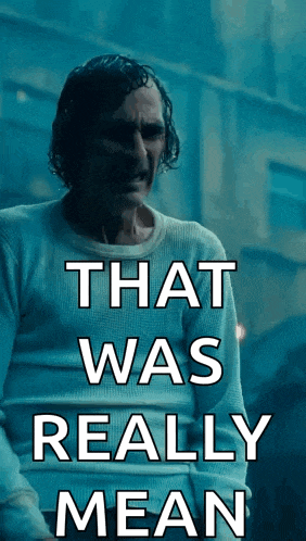 a man in a white shirt with the words that was really mean on it