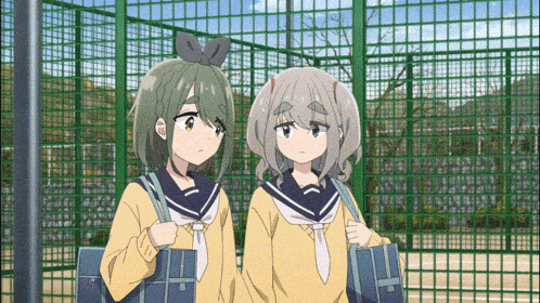 two anime girls standing next to each other holding hands