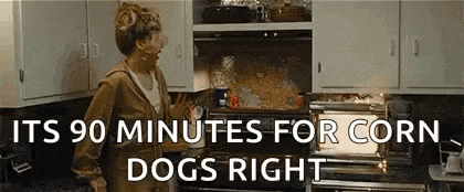 a woman is standing in a kitchen in front of an oven that says `` 90 minutes for corn dogs right '' .
