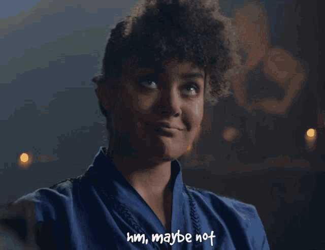 a woman says hm maybe not in a dark room