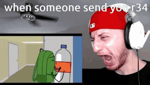 a man wearing headphones is screaming in front of a screen that says when someone send your 34
