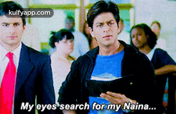 a man in a suit and tie is saying my eyes search for my naina