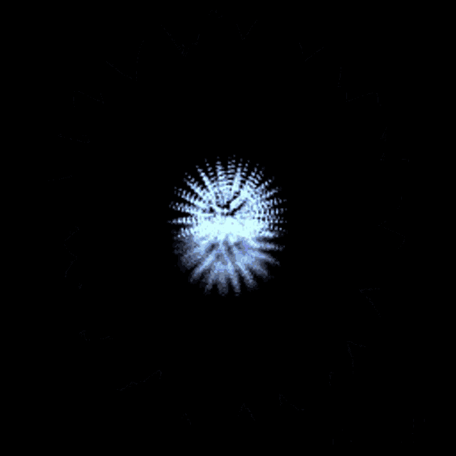 a blue flower with a black background is spinning