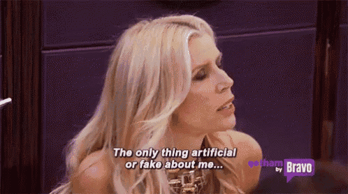a woman is talking to someone and says the only thing artificial or fake about me
