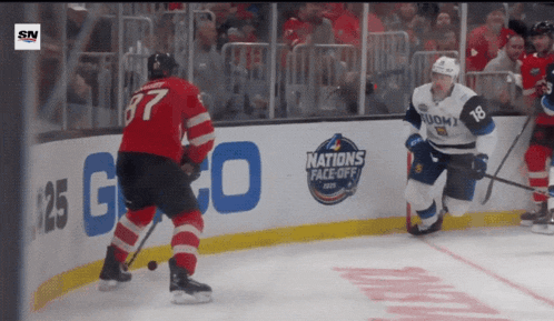 a hockey game is being played at the nations face-off