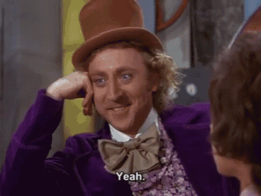 a man wearing a top hat and a bow tie says " yeah "