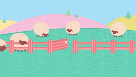a bunch of sheep are behind a fence and one of them has the letter u on it