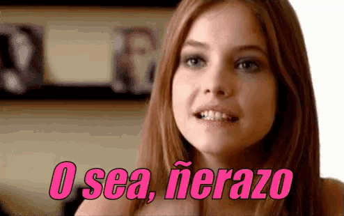 a woman is smiling with the words o sea nerazo written in pink