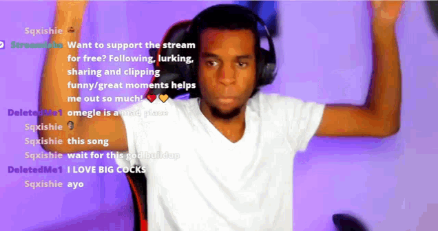 a man wearing headphones is sitting in front of a screen that says " want to support the stream for free " on it