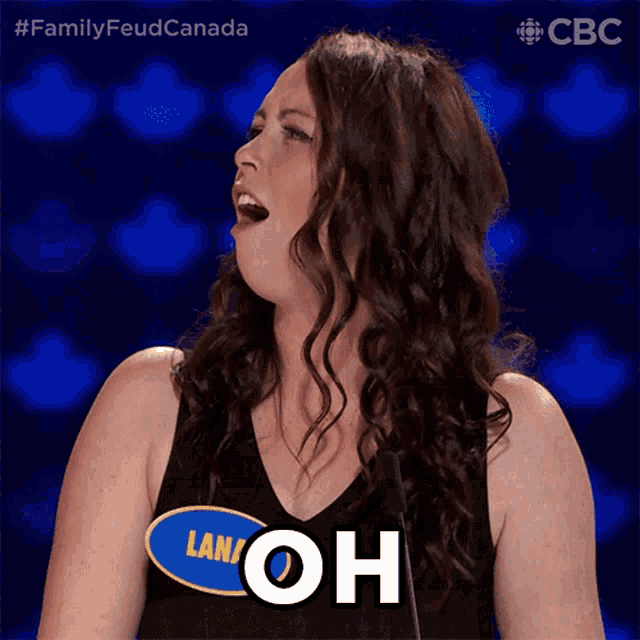 a woman in a black tank top with lana oh written on it