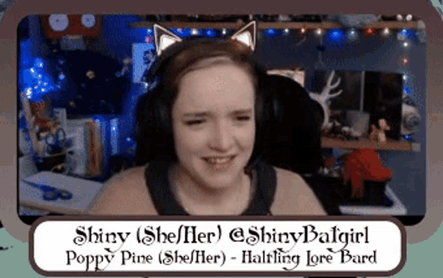 a girl wearing headphones and a cat ear headband named shiny