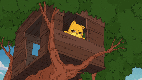 a cat is sleeping in a tree house