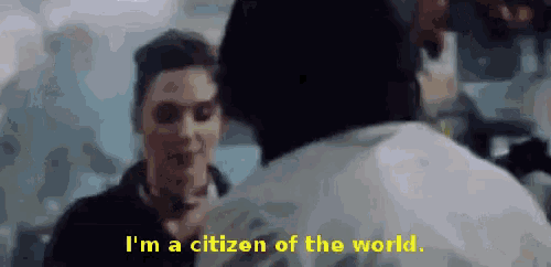 a man and a woman are talking to each other and the man is saying `` i 'm a citizen of the world ''
