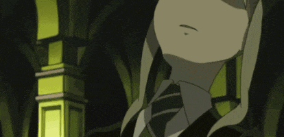 a girl in a suit and tie is standing in a dark room with a pillar in the background .