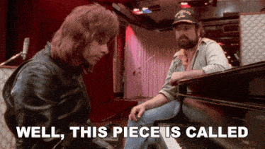 a man playing a piano next to another man with the words well this piece is called