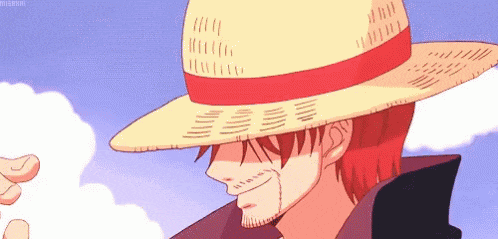 a man with red hair is wearing a straw hat and a black jacket .