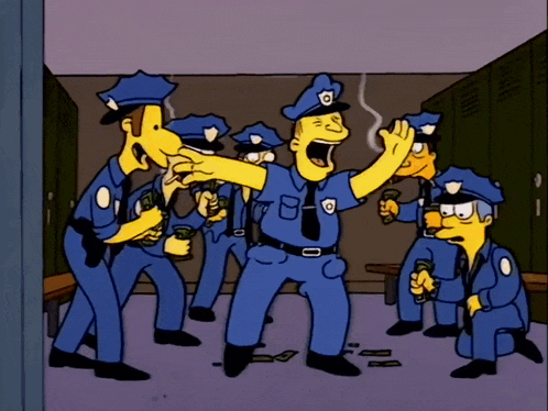 a group of police officers are standing in a locker room holding money